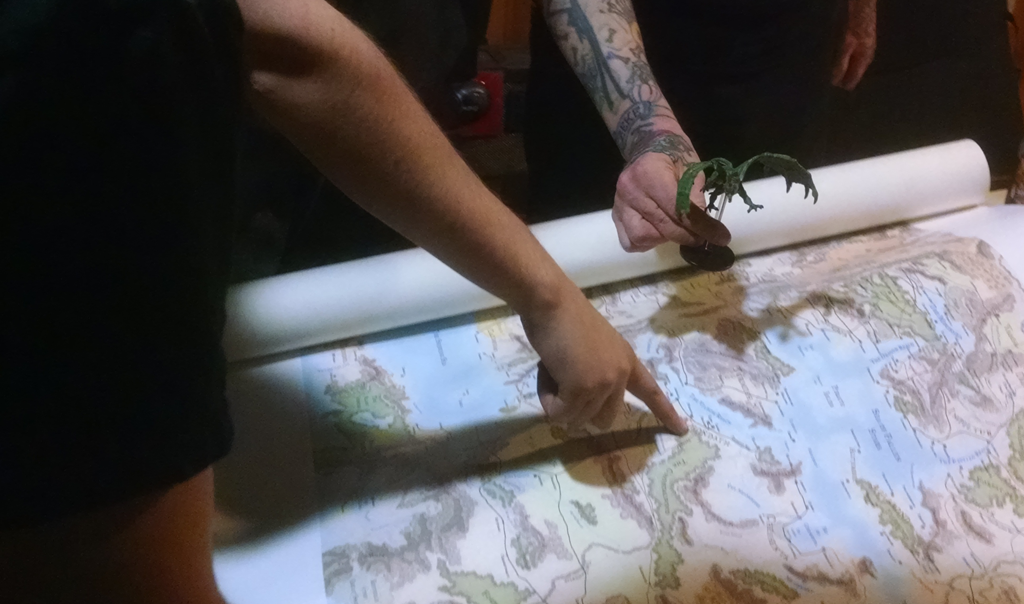Players planning the expedition to Mussum.