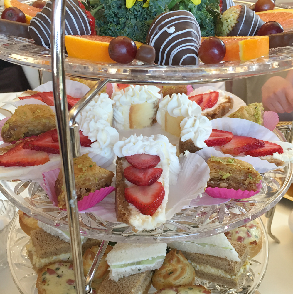 Assortment of sandwiches, dessert and fruit at Silver Spoon Tea House.