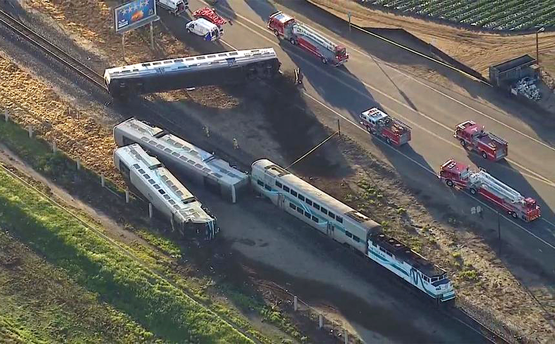 Abandoned truck’s driver arrested after commuter train crash The