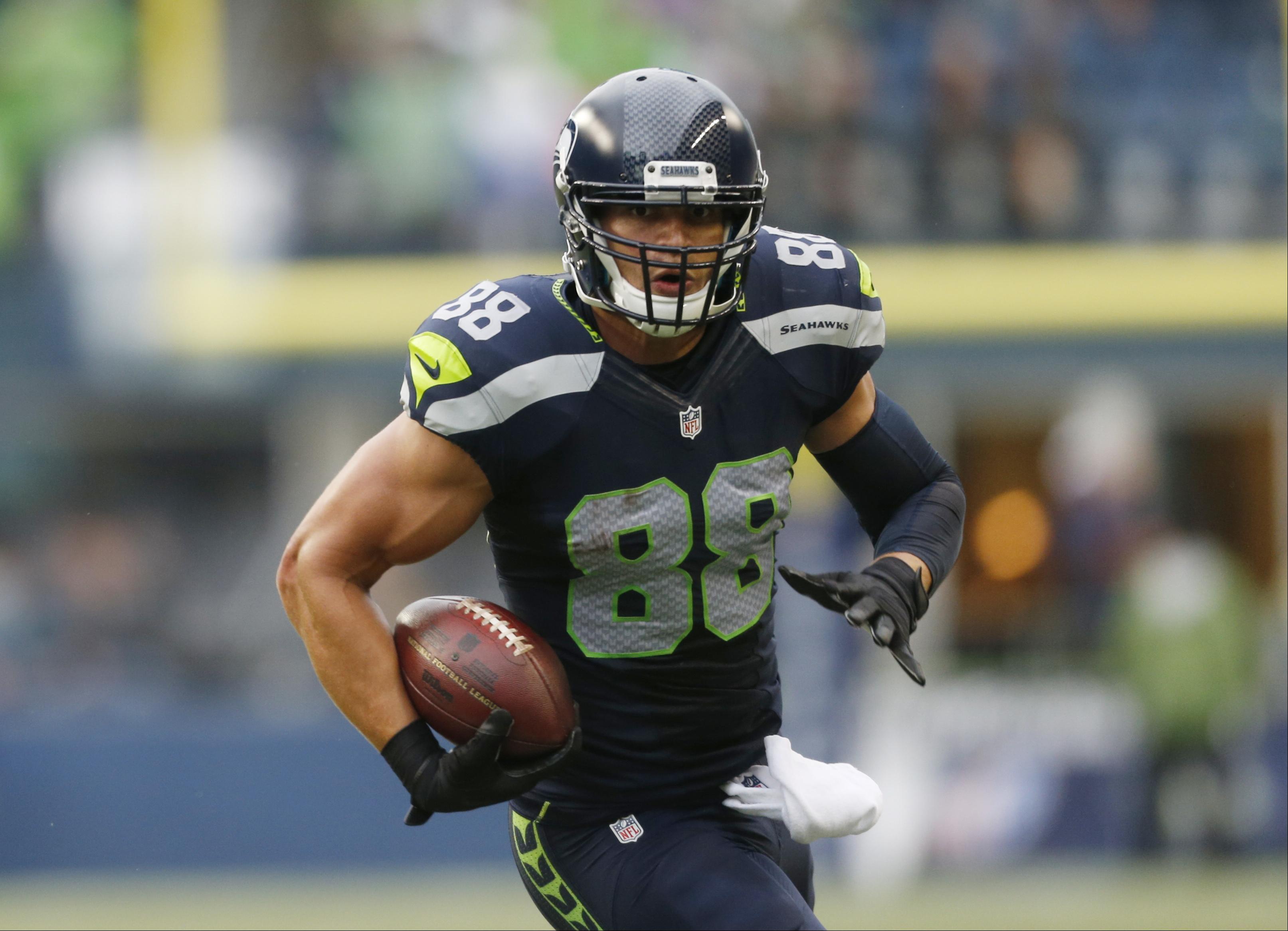 Seahawks tight end Jimmy Graham builds strength on basketball court