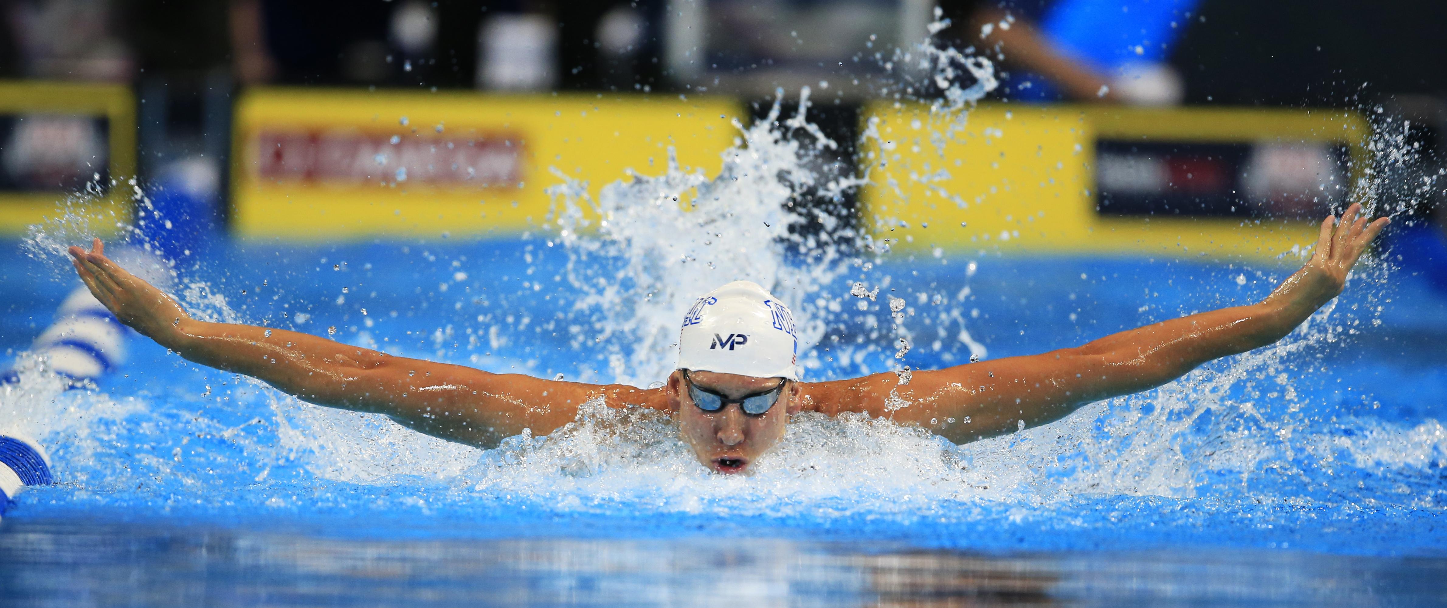 Phelps, Ledecky cruise into semis at US Olympic swim trials The