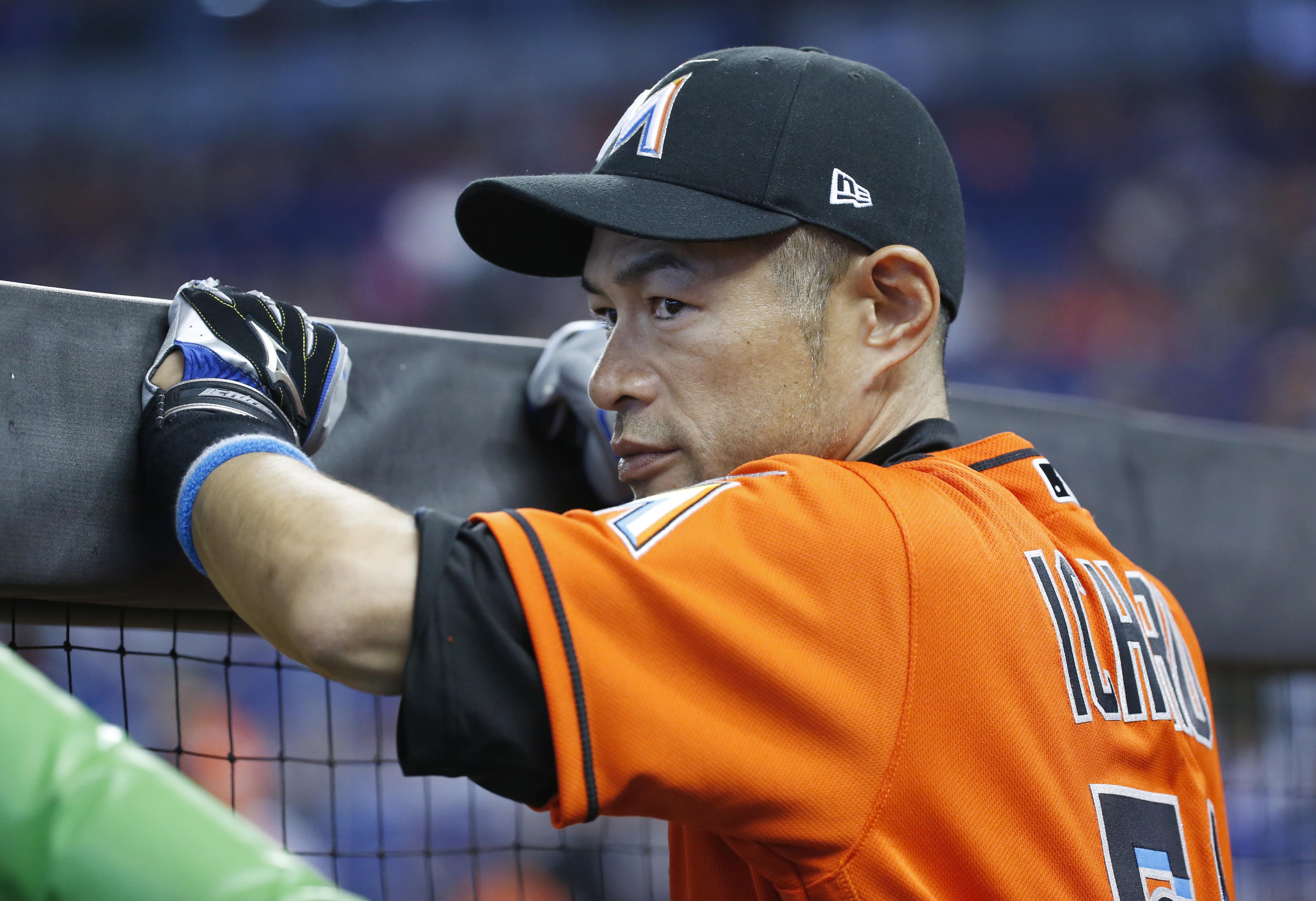 guy in orange marlins jersey