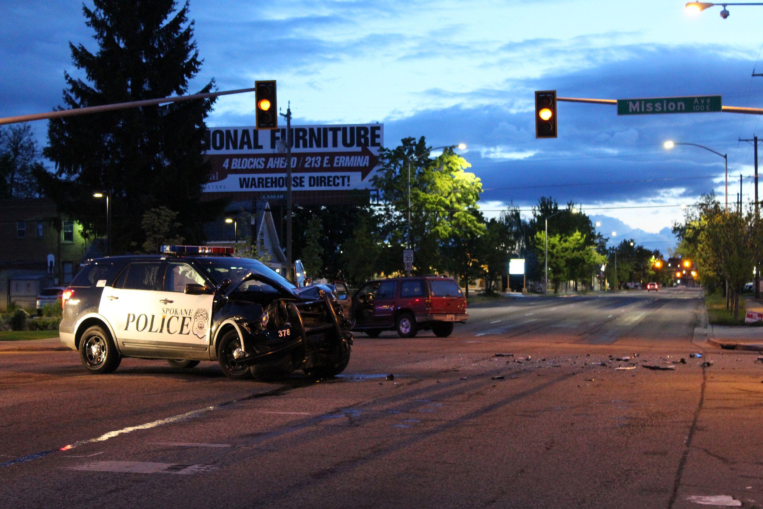 Woman seriously injured in crash with Spokane police car The