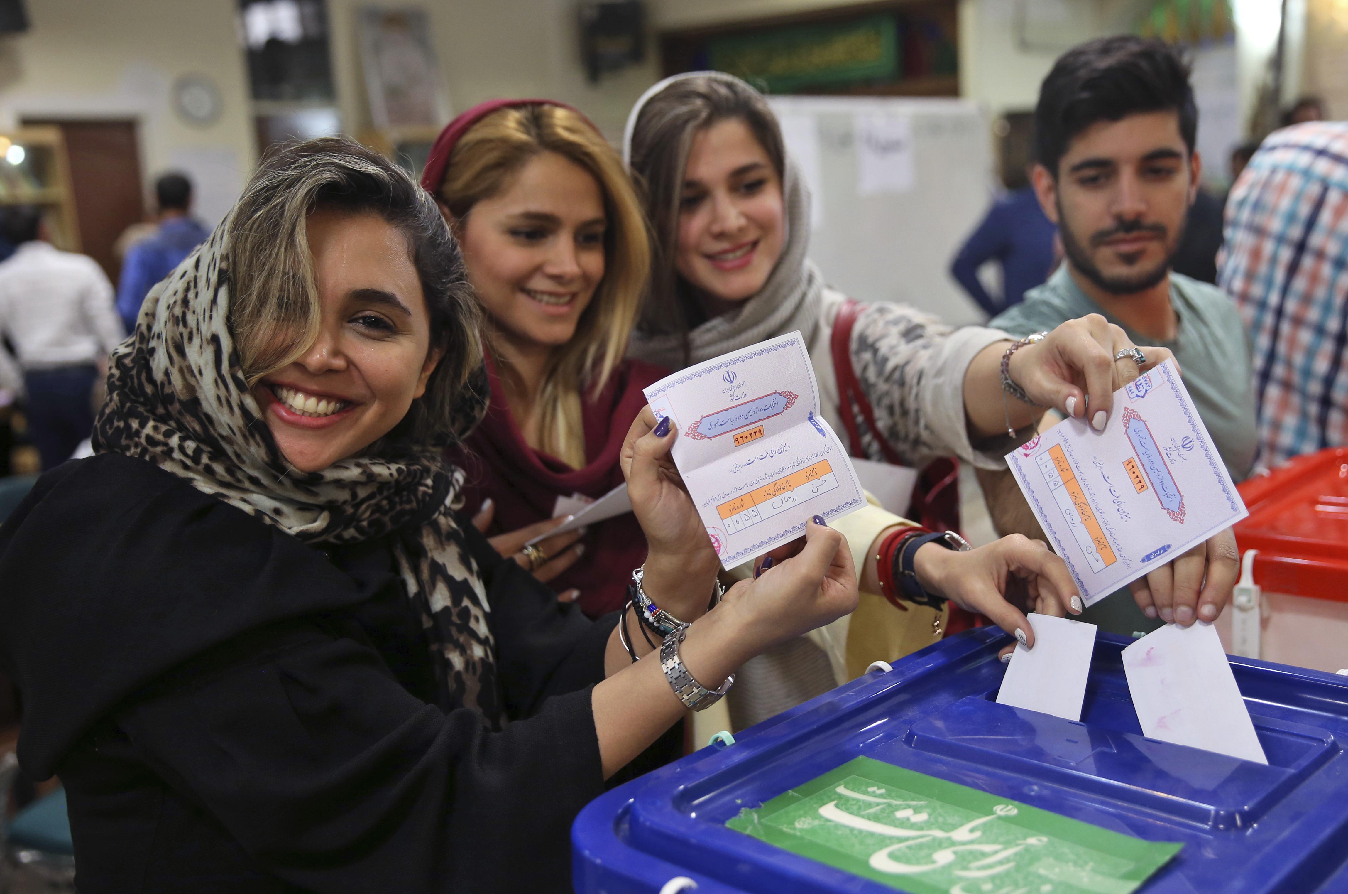 Iranians turn out in large numbers for closely watched vote The
