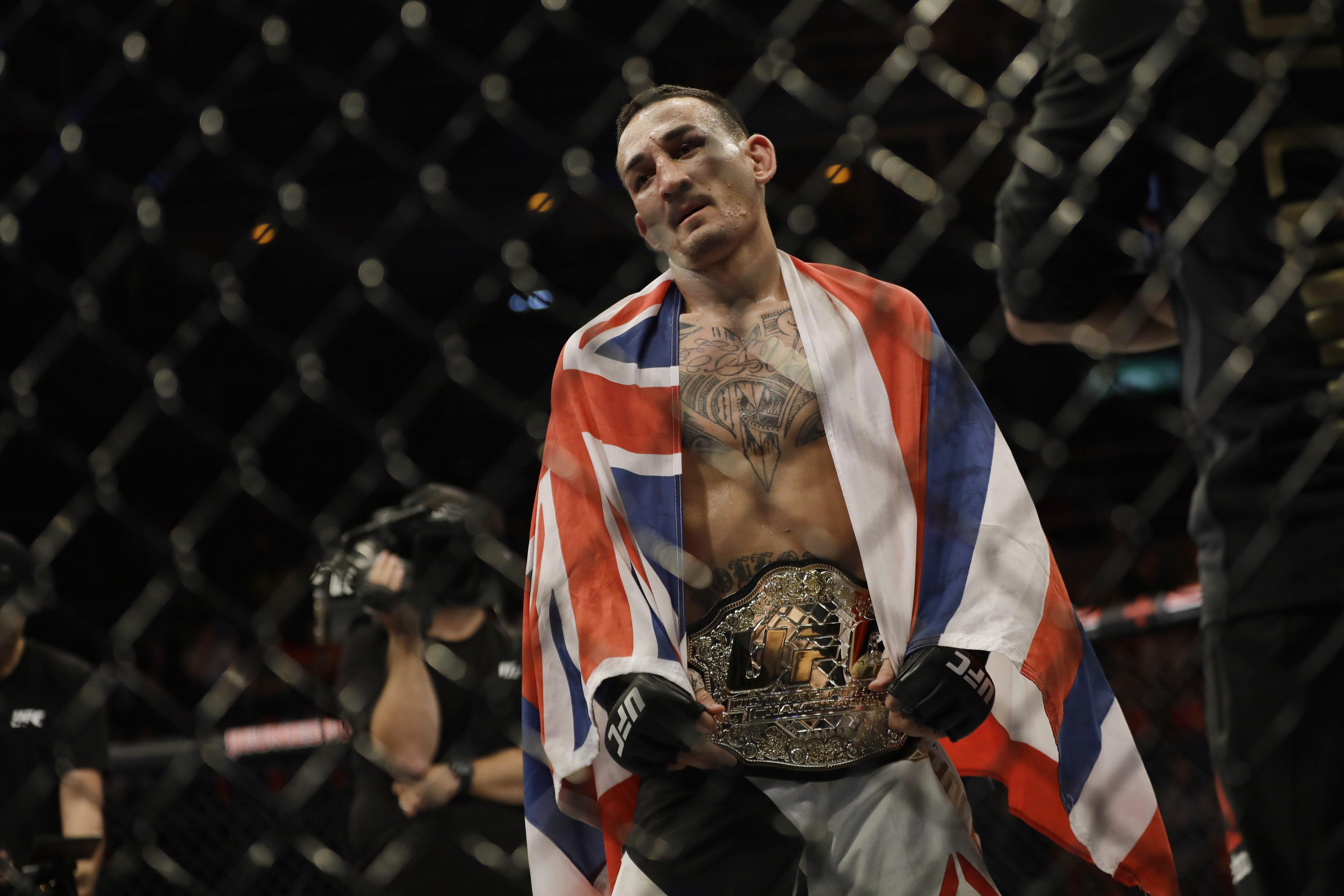 Max Holloway stops Jose Aldo in 3rd, wins UFC featherweight belt The