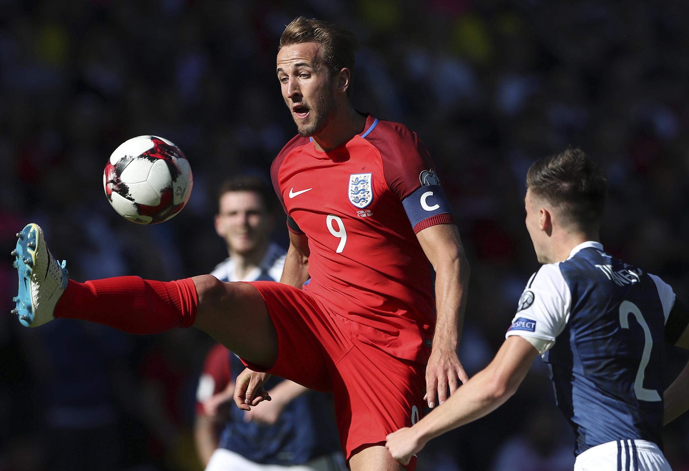 Harry Kane Rescues England As Hat Tricks Light Up Euro Qualifiers England S Harry Kane Left View For The Ball Next To Scotland Charlie Tierney During