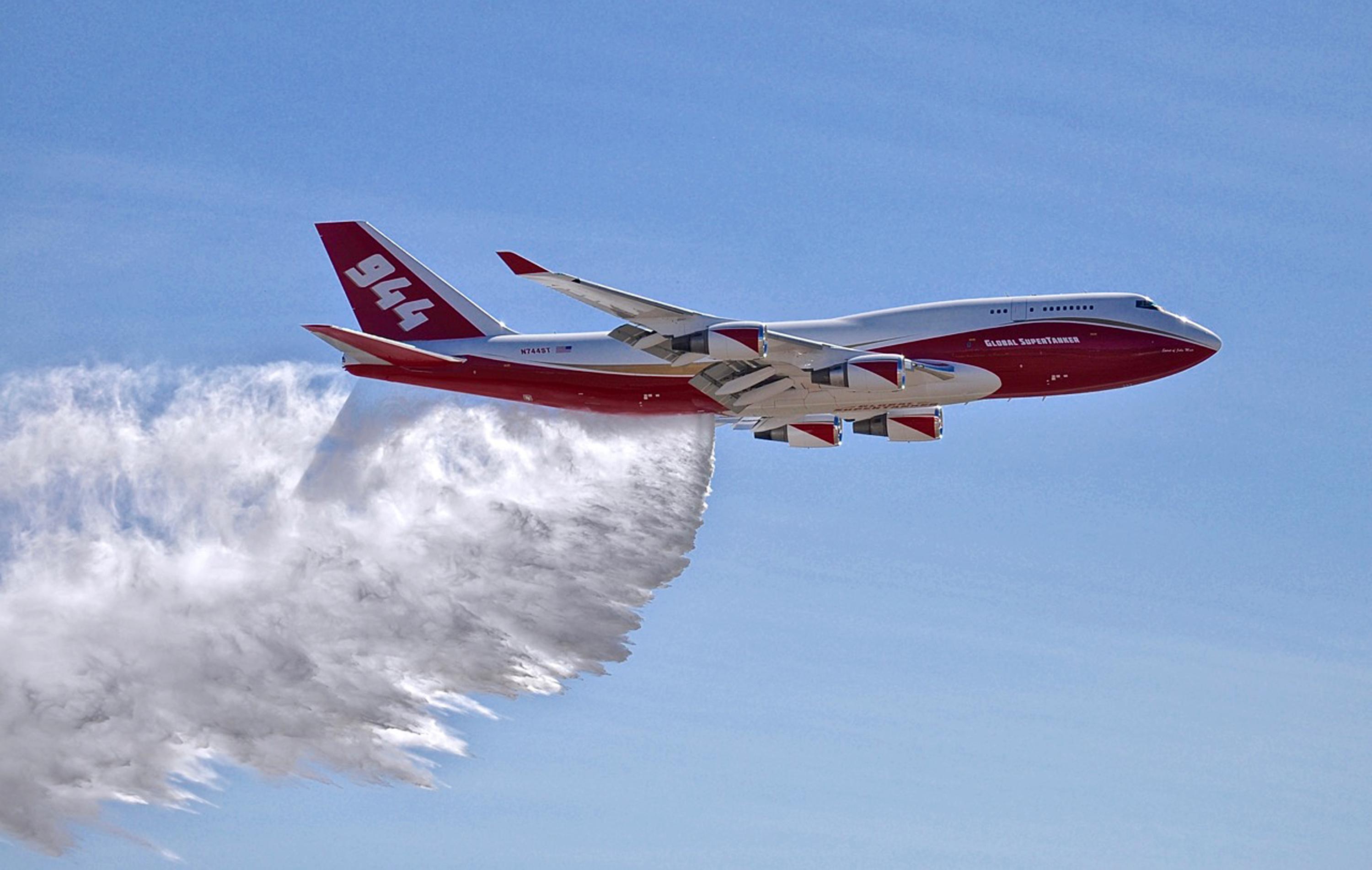 Debate over use of jumbo bomber as wildfires rage in West The