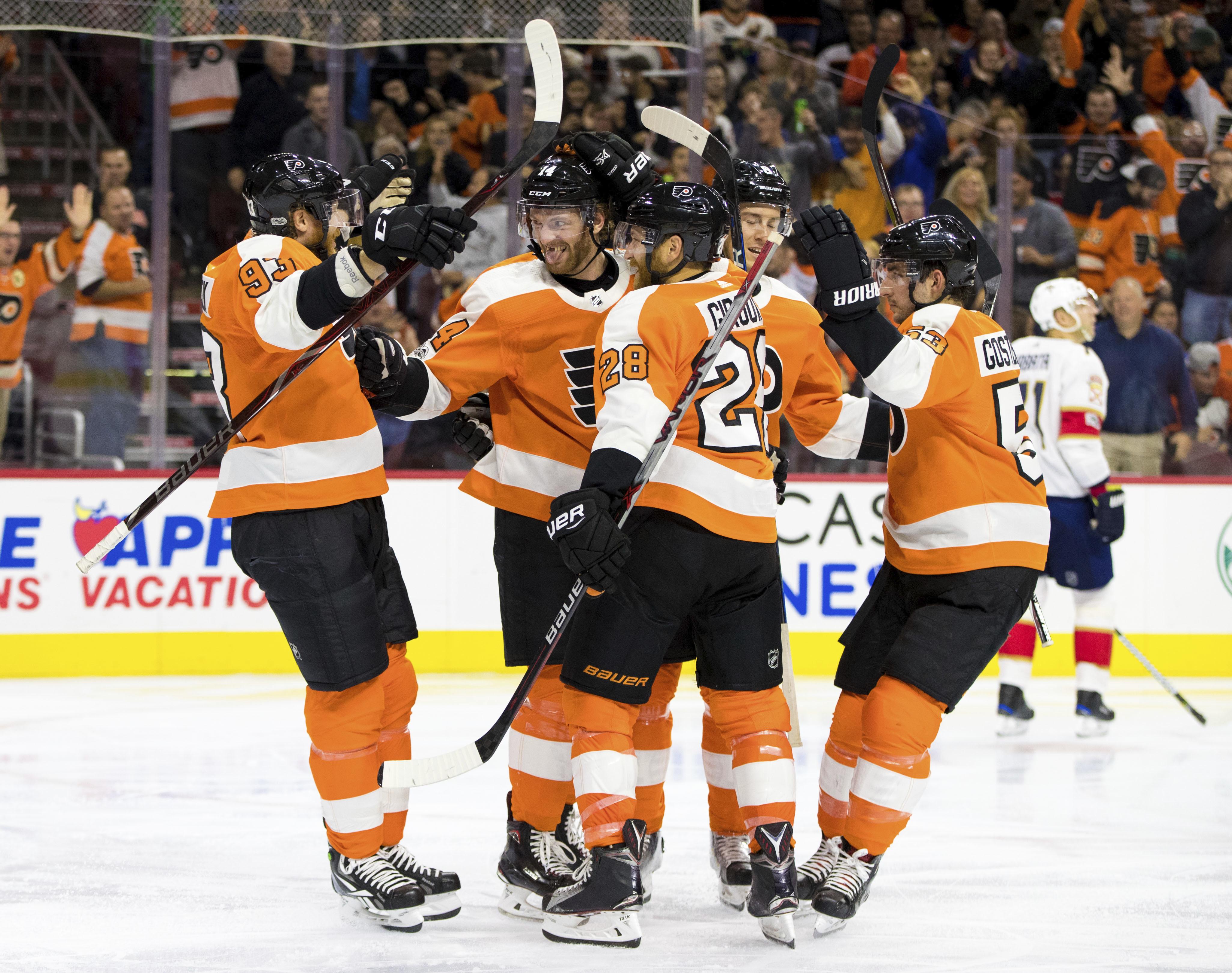 Claude Giroux scores in OT, Flyers beat Penguins in Stadium Series