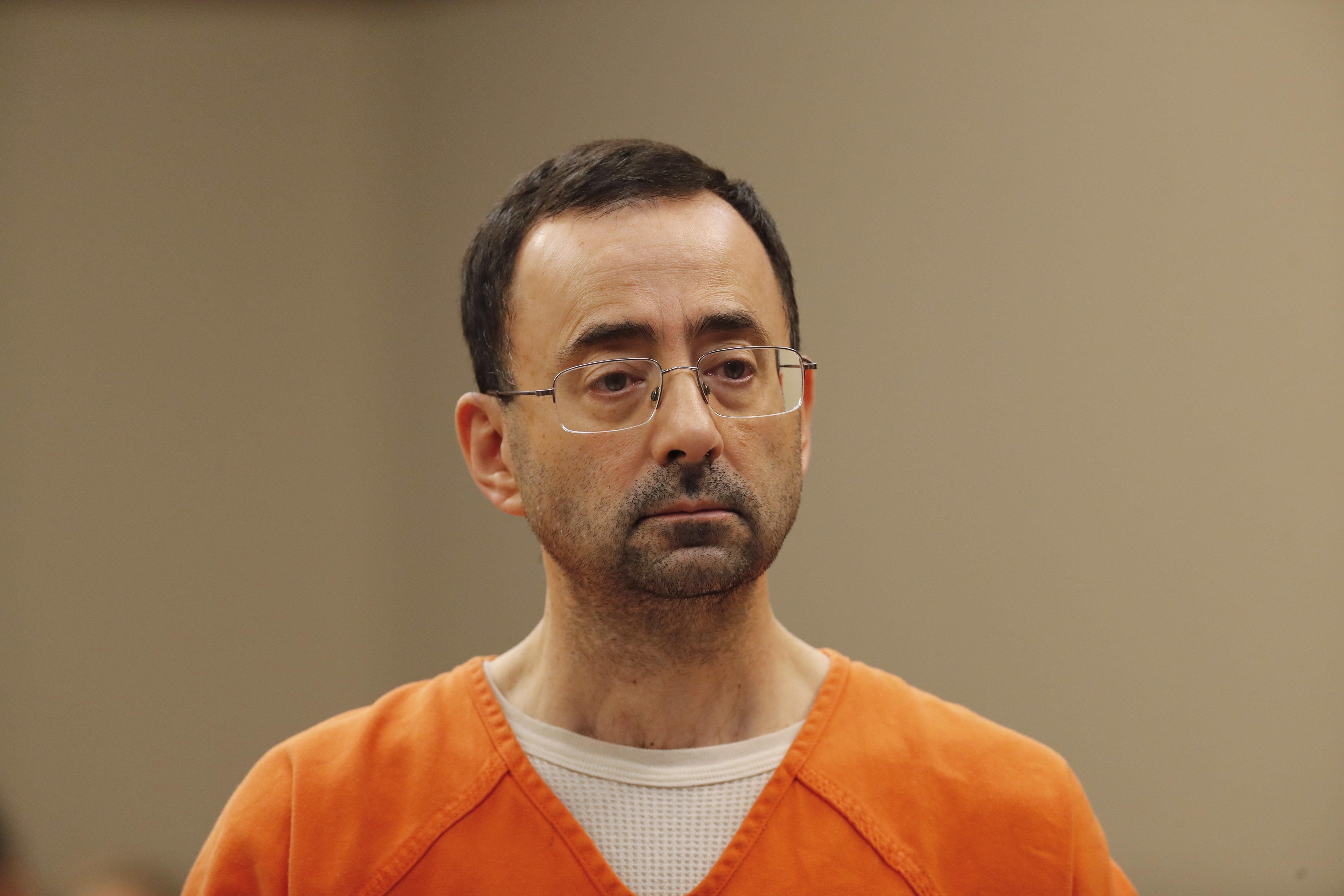Gymnasts - USA Gymnastics doctor gets 60-year prison sentence for child ...