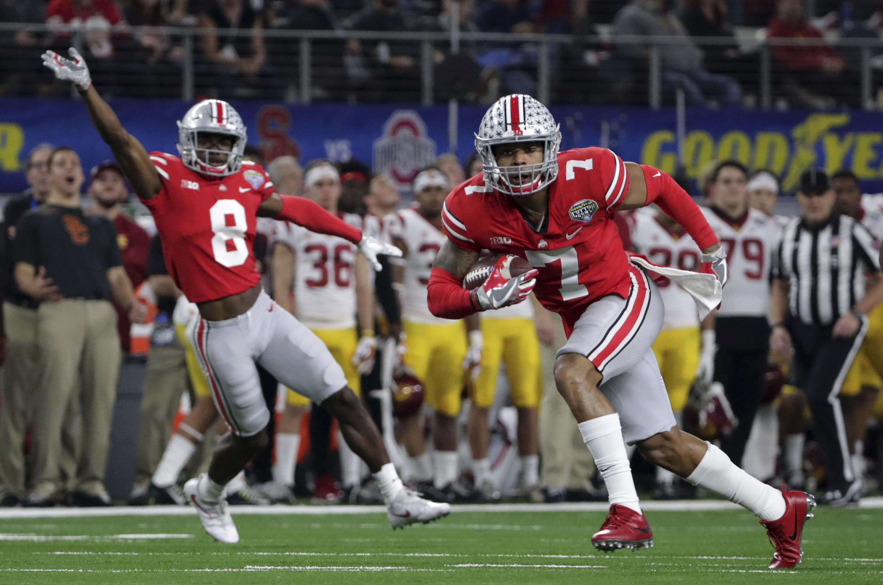 Friday’s bowl games: Ohio State has easy time with USC | The Spokesman