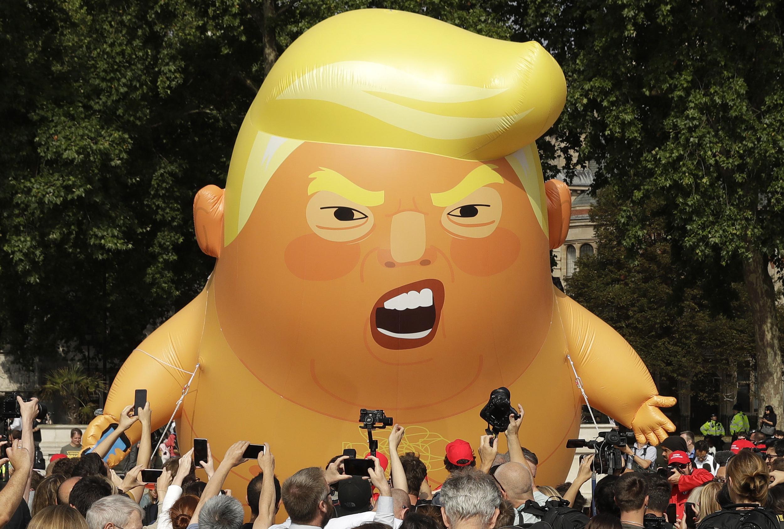Download U.K. demonstrators march against Trump, mock with giant balloon | The Spokesman-Review
