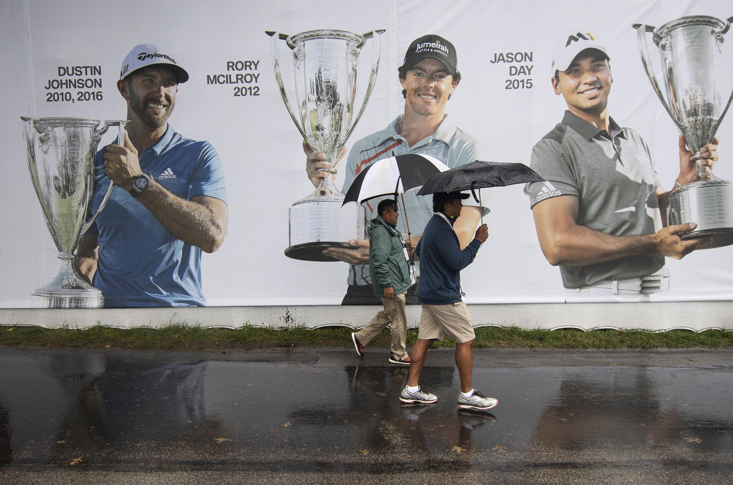 Justin Rose Waits Through A Day Of Rain At Bmw