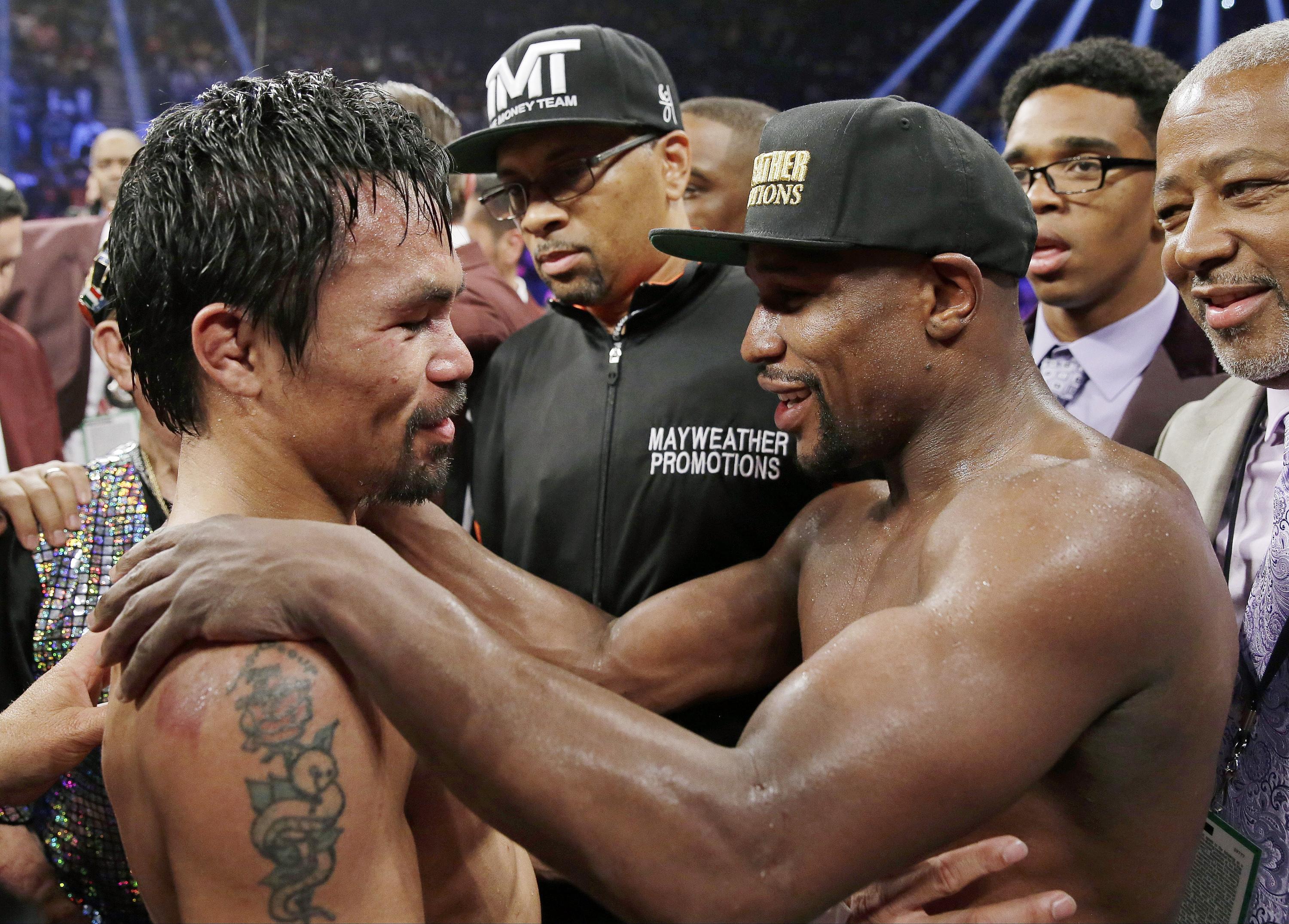 On again? Floyd Mayweather says he and Manny Pacquiao will ...