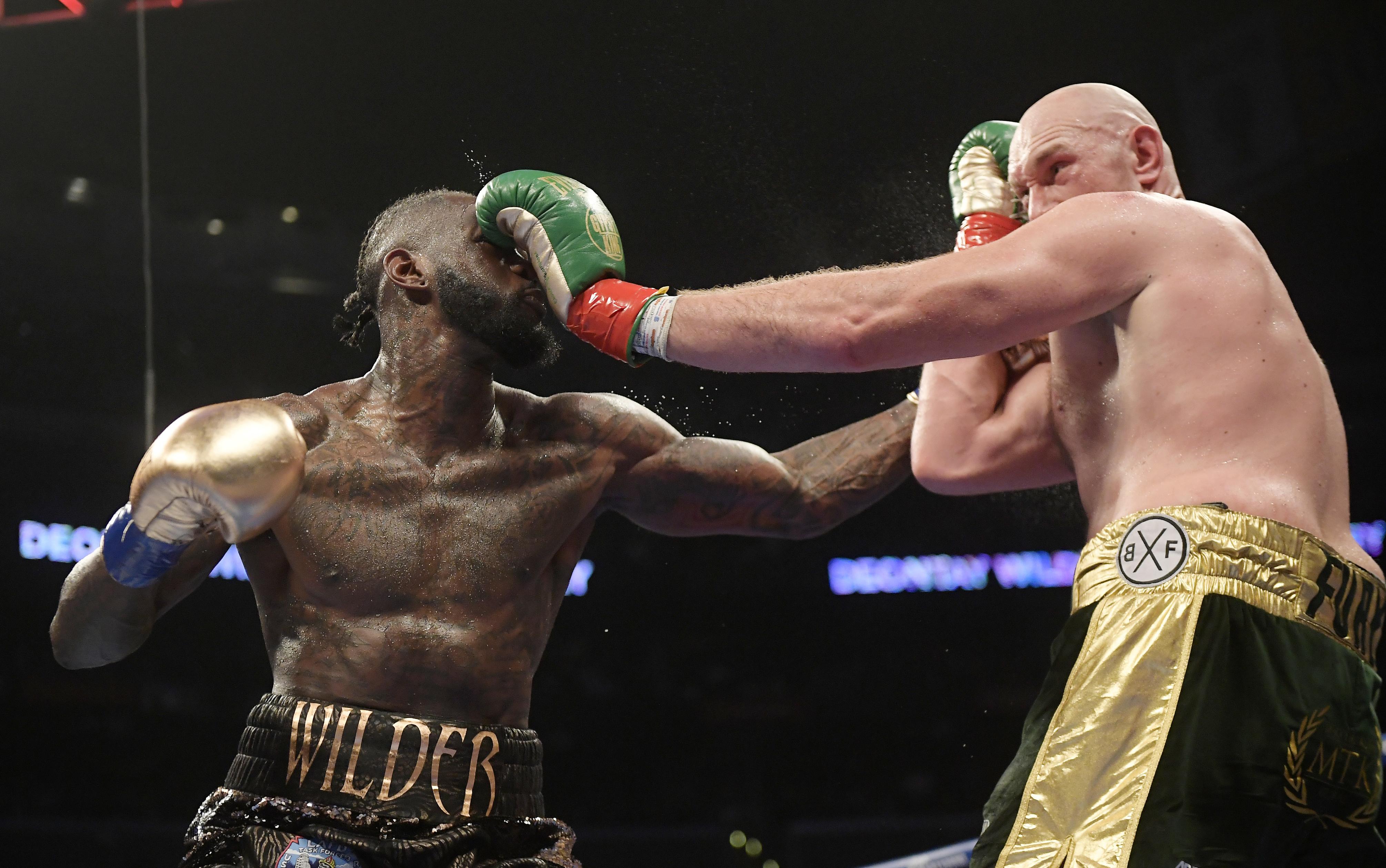 Deontay Wilder keeps heavyweight title, fights Tyson Fury to split draw