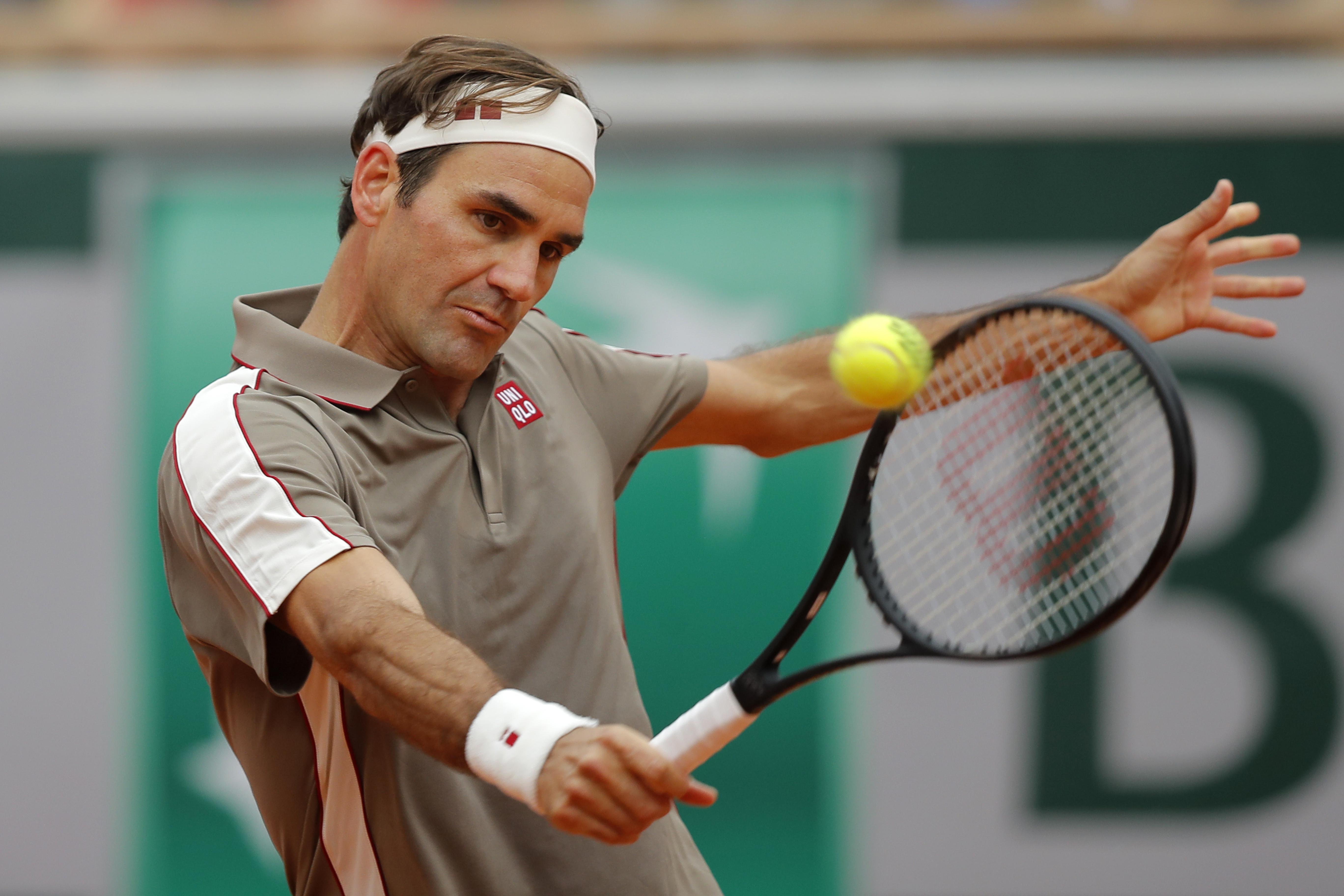 Roger Federer wins easily in first French Open match since ...