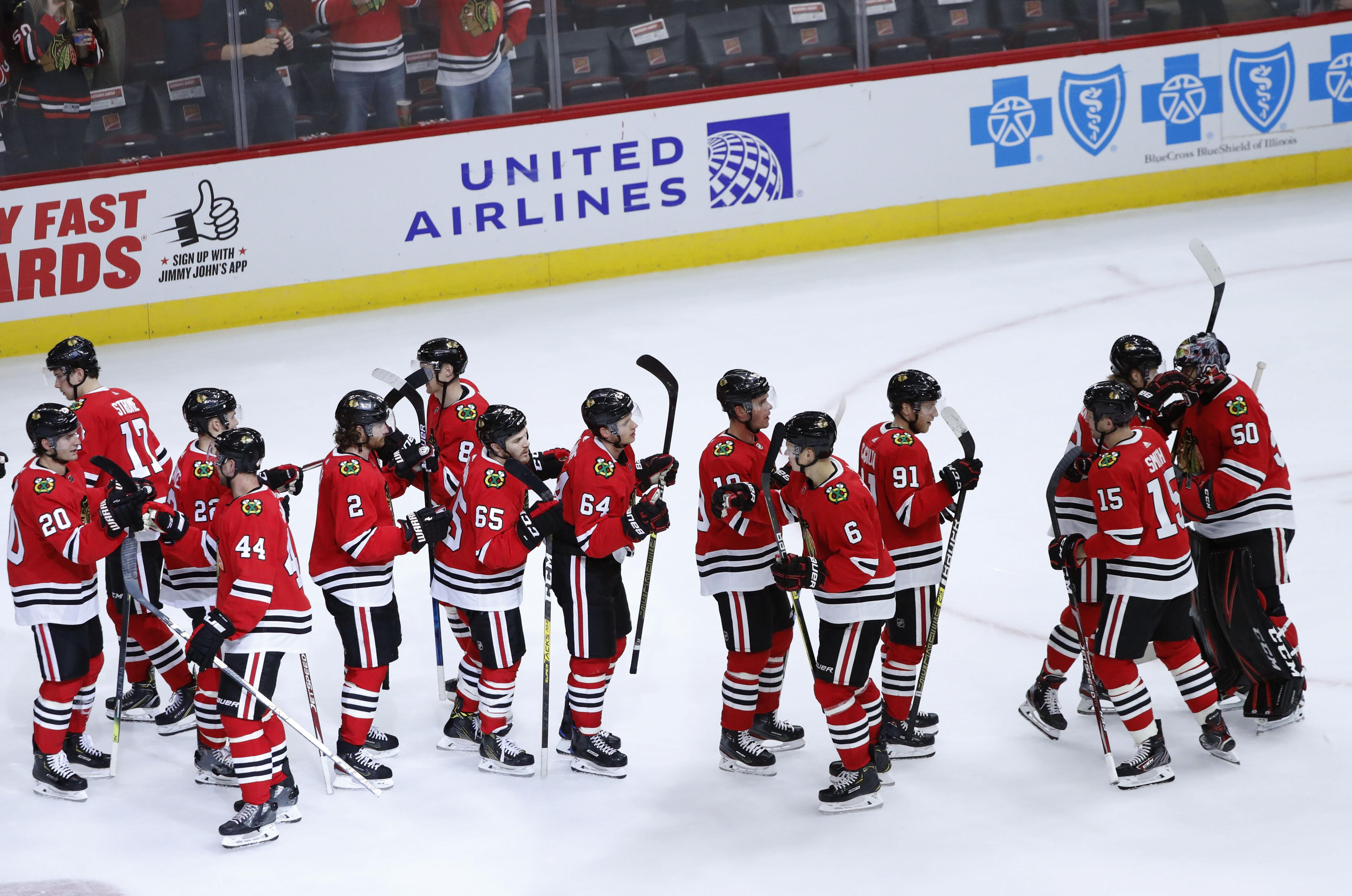 NHL capsules Chicago Blackhawks pick up first win of season The