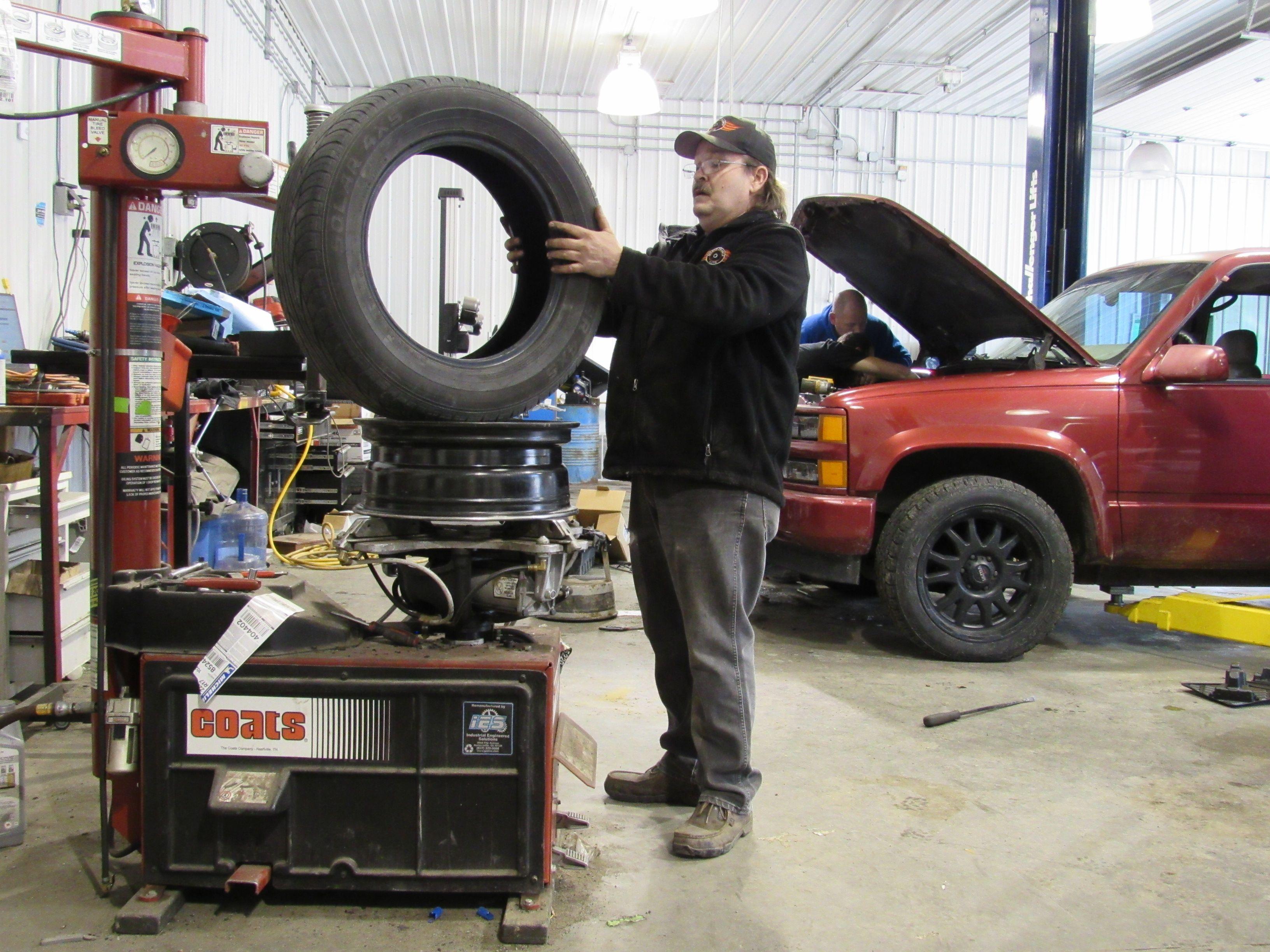 Changing oil and lives. Kentucky shop trains mechanics as they work to