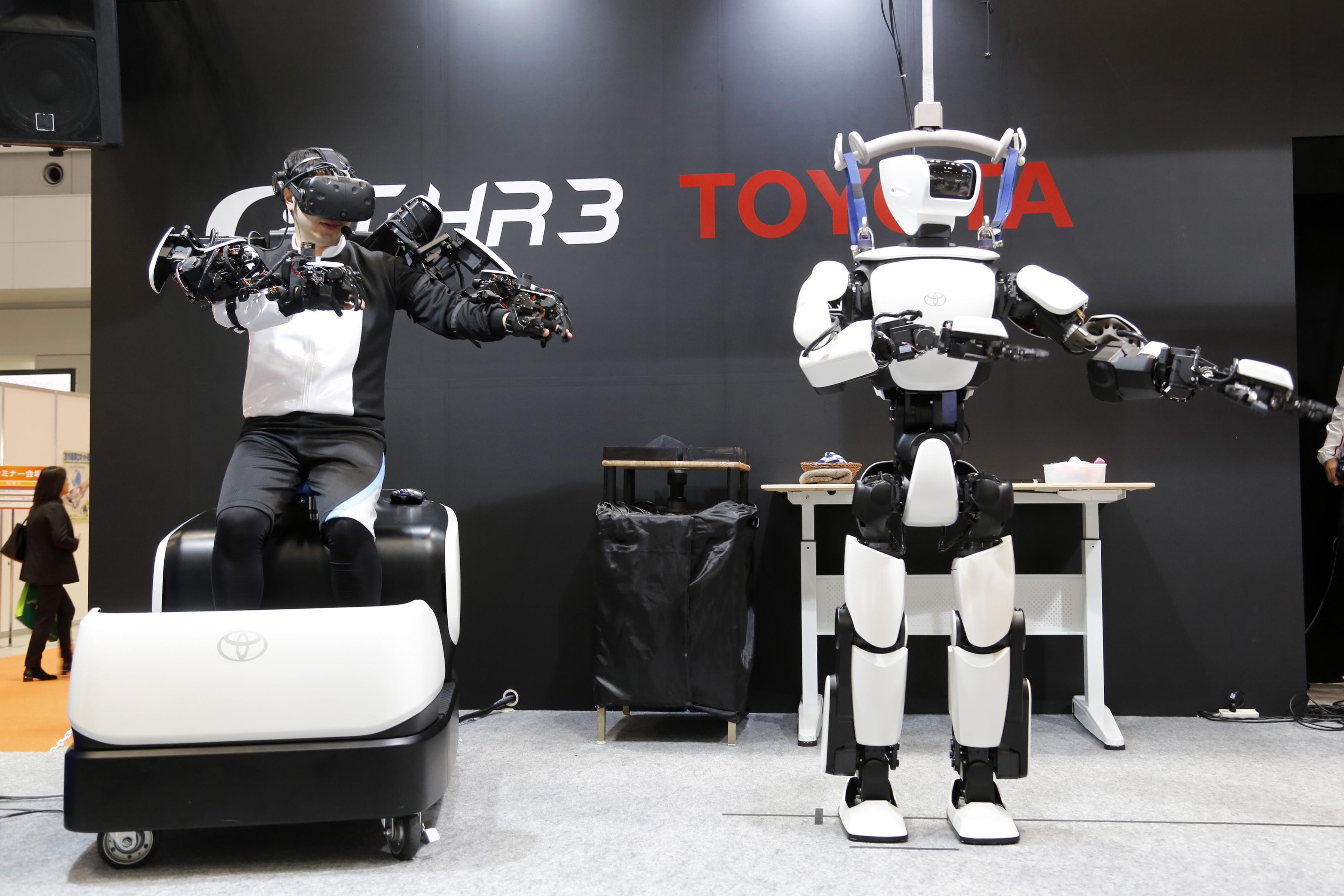 Toyota unveils upgraded version of its humanoid robot | The Spokesman ...