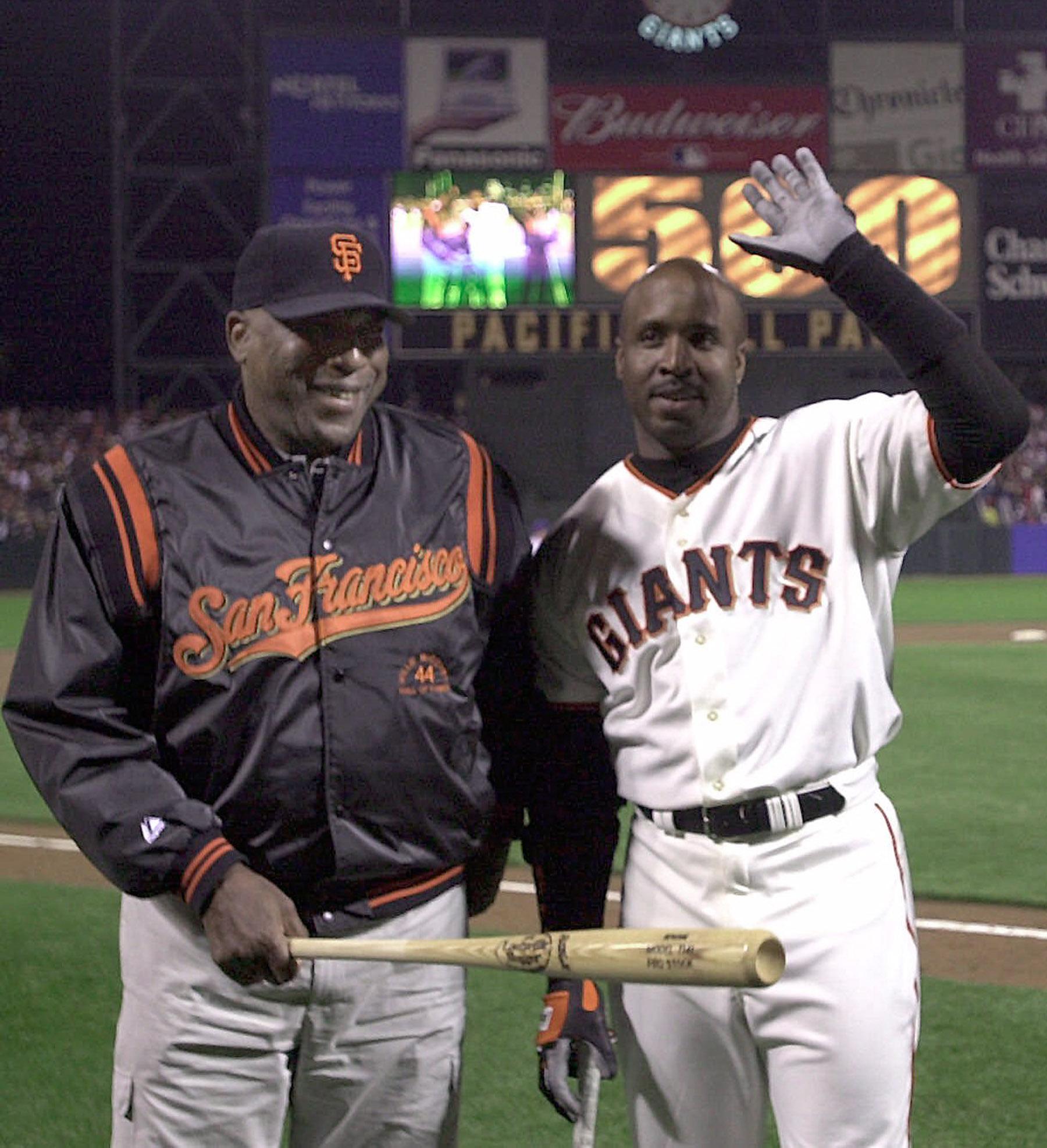 Barry Bonds of the San Francisco Giants celebrates after hitting