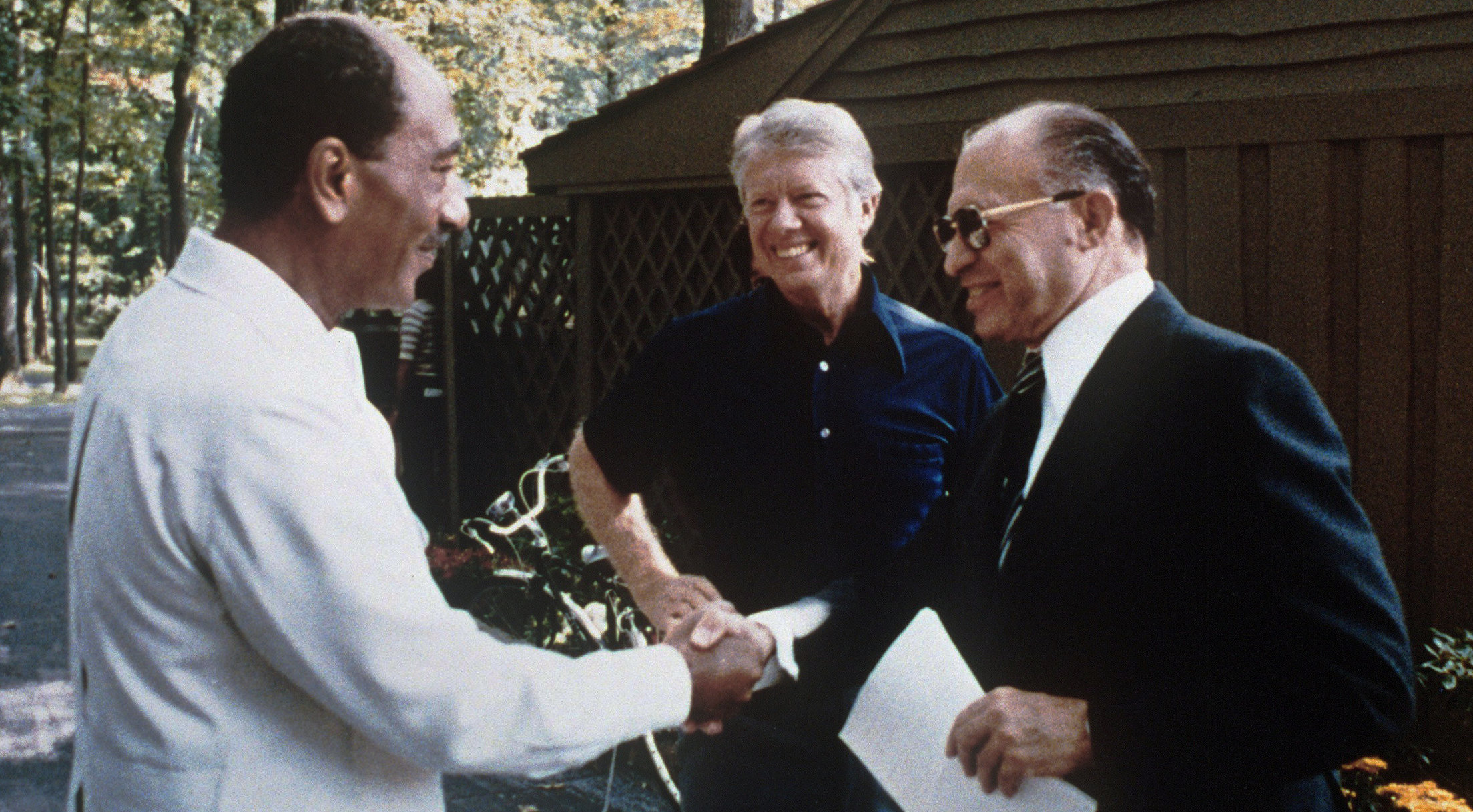 Carter with Egypt’s Anwar Sadat, left, and Israel’s Menachem Begin, right, at Camp David in September 1978, National Archives