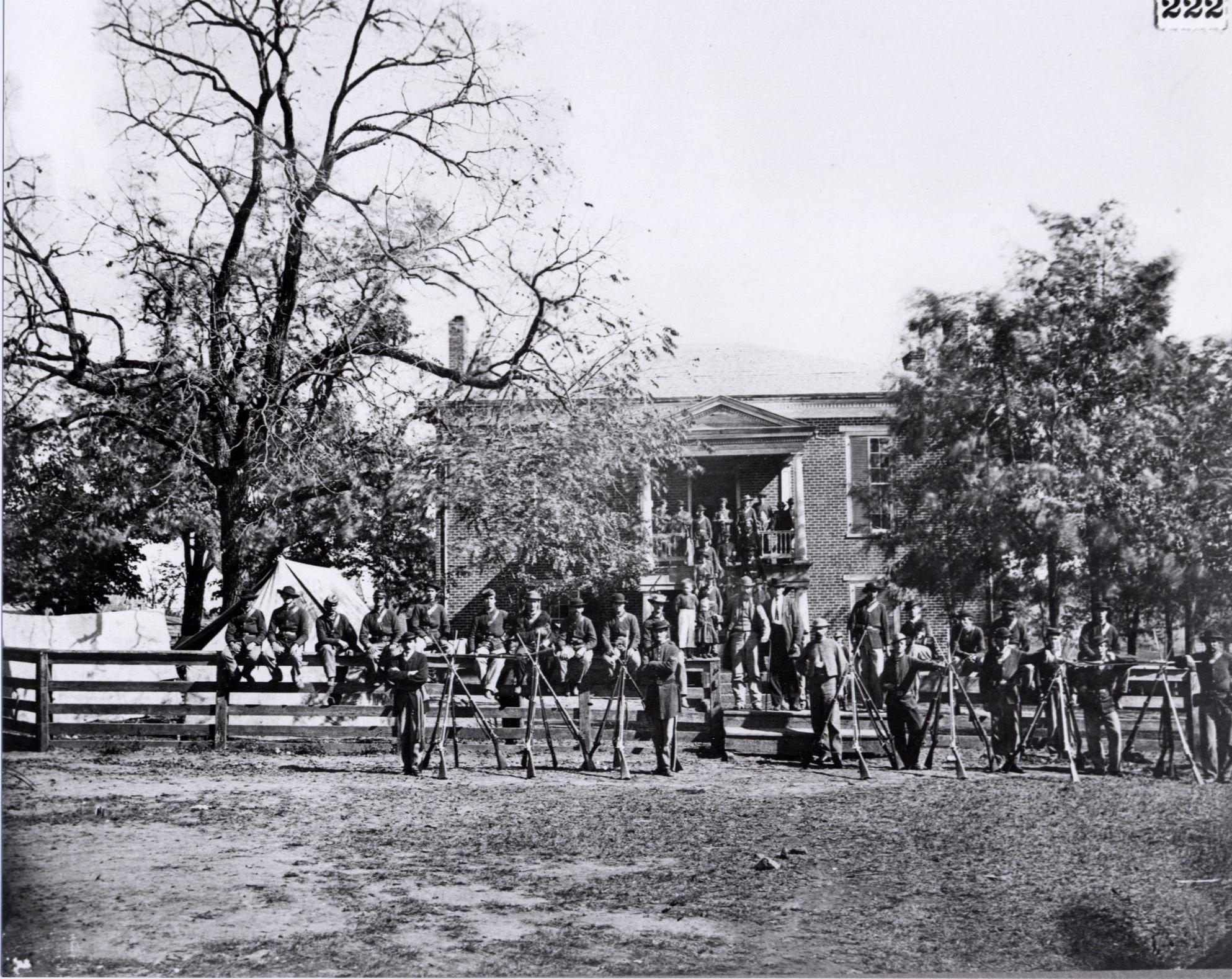 Federal soldiers rest in front of the McLean house at Appomattox Court House, Virginia, in April 1865. Source: Library of Congress