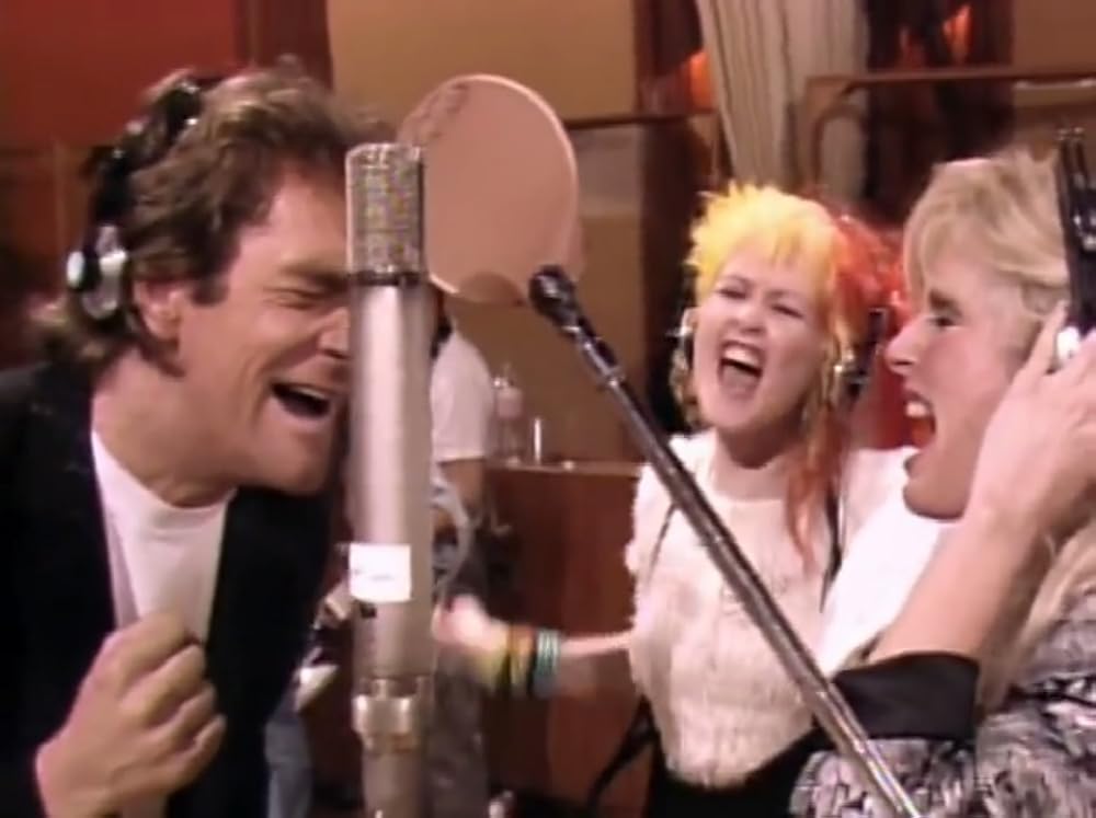 Huey Lewis, Cyndi Lauper, and Kim Carnes sang the song's bridge.