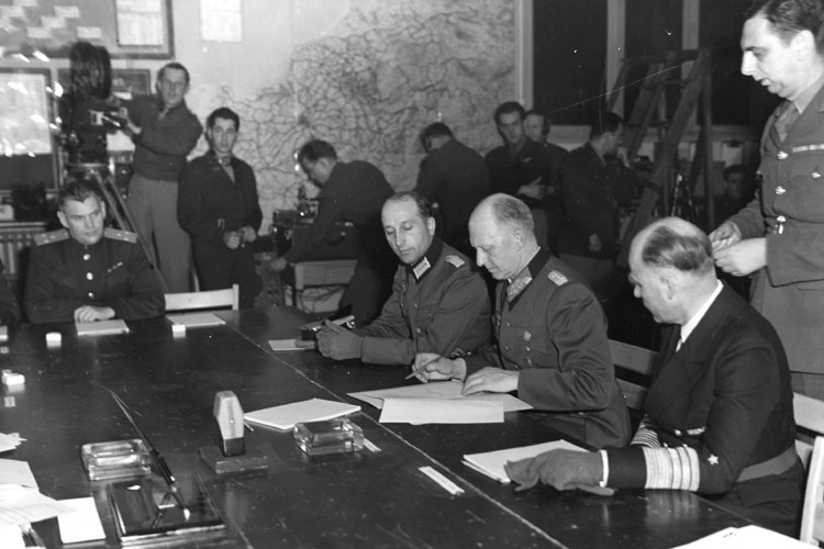 At the insistence of Soviet leader Joseph Stalin, German Field Marshall Wilhelm Keitel signs a second surrender, an “Act of Military Surrender” with a few “insignificant” changes from the original, in Berlin on May 8. Source: Natoinal Archives