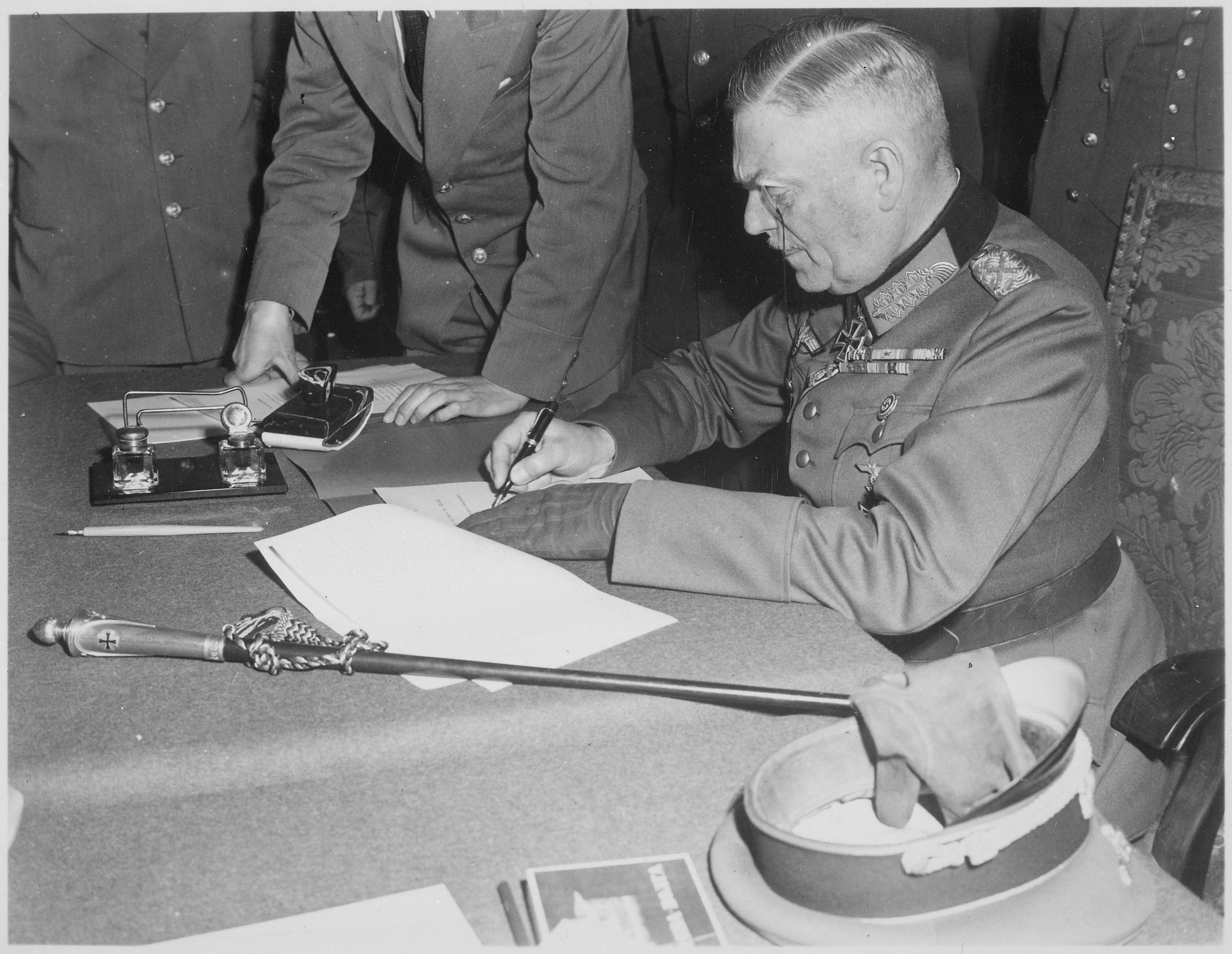 At the insistence of Soviet leader Joseph Stalin, German Field Marshall Wilhelm Keitel signs a second surrender, an “Act of Military Surrender” with a few “insignificant” changes from the original, in Berlin on May 8. Source: Natoinal Archives
