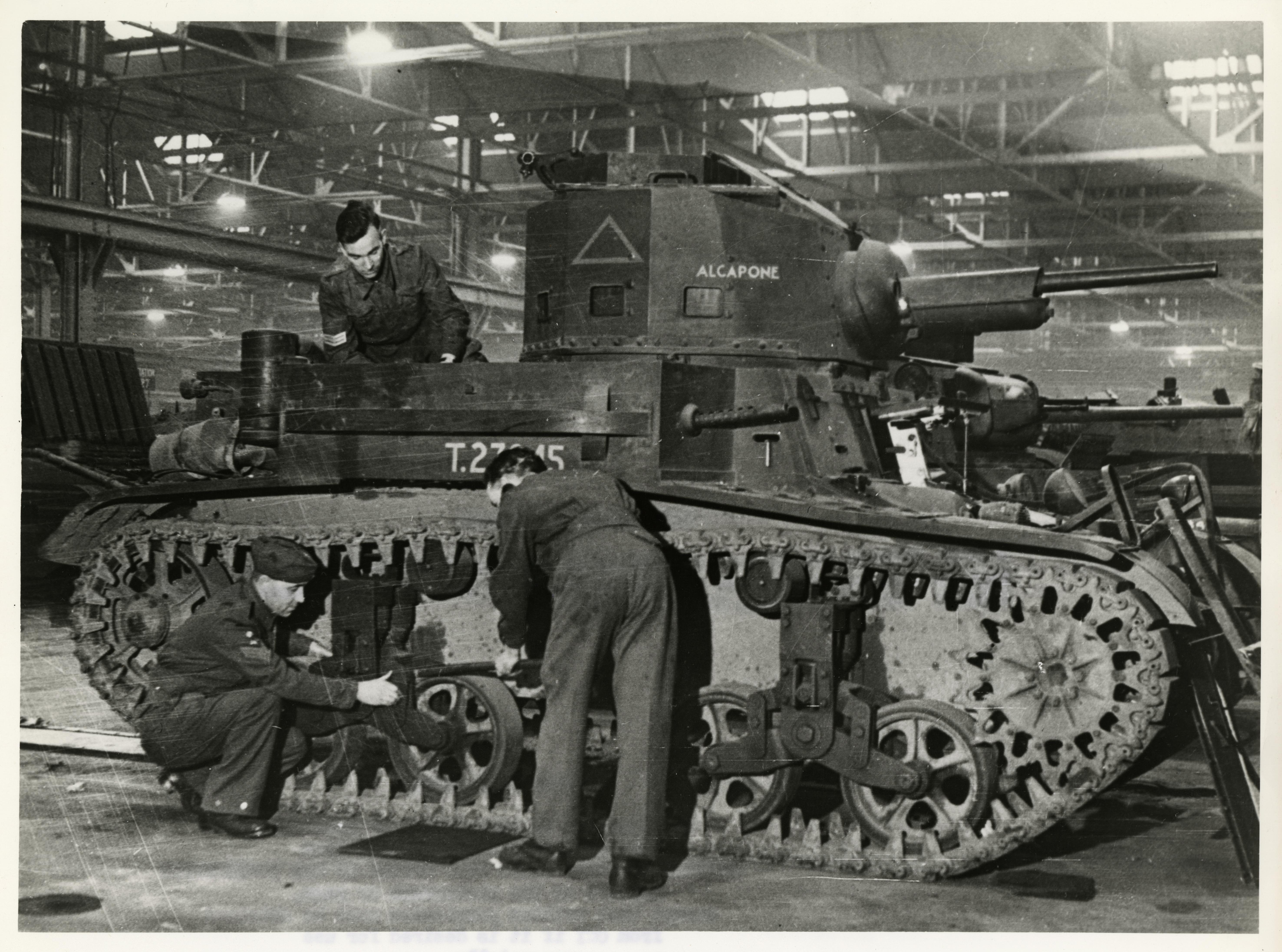 Fitters assemble a U.S. light tank that was shipped to England. Photo from the FDR Presidential Library and Museum.