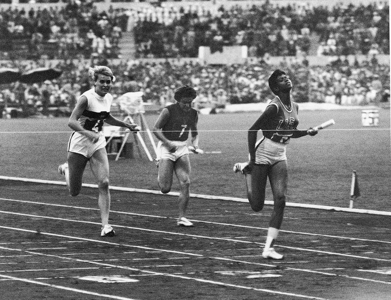 Rudolph finishes in world-record time in the first round of the 4x100 relay. Photo sourced from the International Olympic Committee.