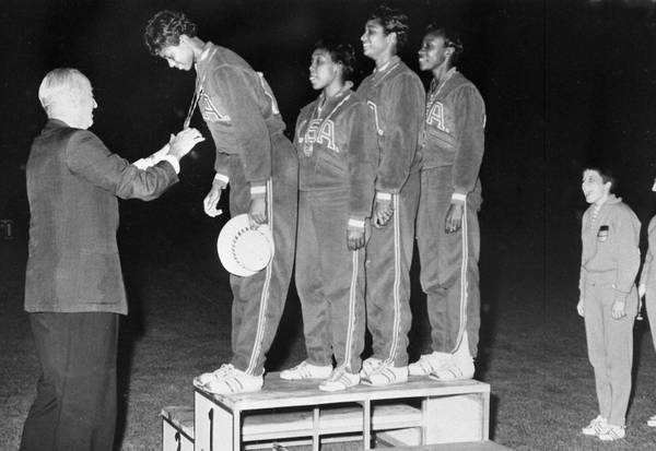 Rudolph and the TigerBelles receive their gold medals. Photo from WikiMedia Commons.