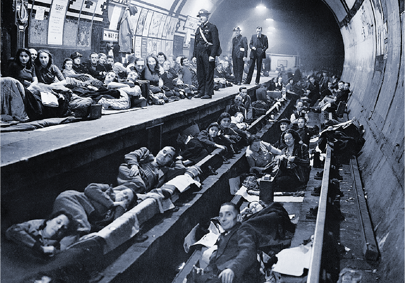 Civilians take refuge in the Aldwich subway “tube” in October 1940. Seventy nine “tube” stations were used as air raid shelters during the Blitz. Photo from the Imperial War Museum.