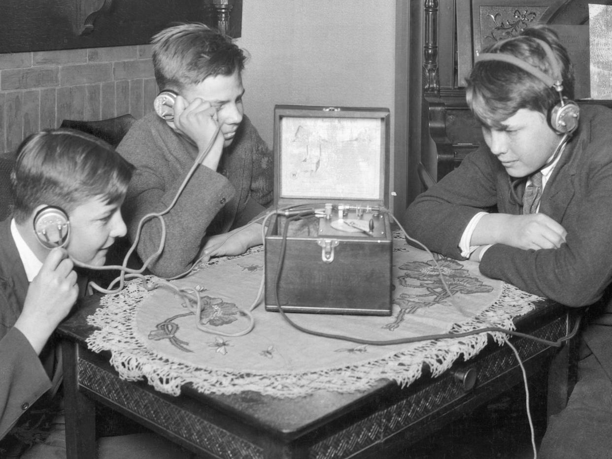 Notice these boys listening to their crystal set with headphones. It wasn’t until radios built with vacuum tubes came along later in the 1920s that sets were powerful enough to run loudspeakers.