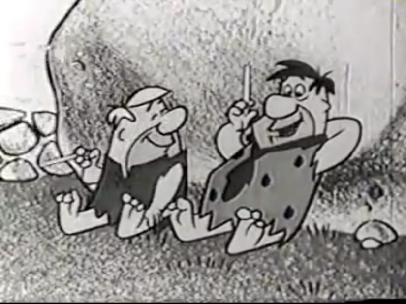 Tobacco companies even sponsored animatedshows. Here, Fred Flintstone and his pal, Barney, enjoy a Winston cigarette break.