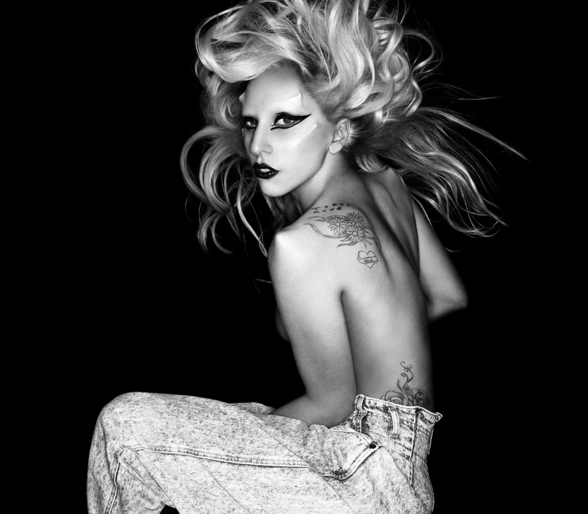 The artwork for the “Born This Way” single featured Gaga wearing heavy makeup and with air-blown hair.